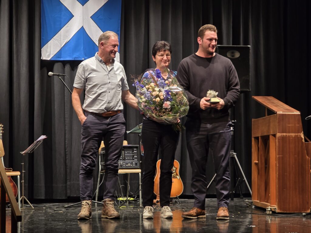 Il retg dalla lutga e burgheis da Mustér, ensemen cun ses geniturs Paul e Helen Orlik.